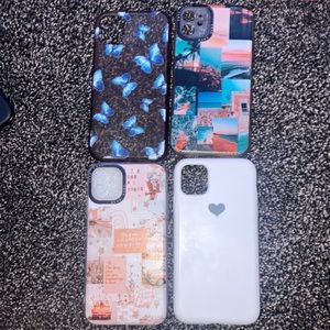4 iphone 11 cases, one butterfly, 2 summer ones, and a white silicon case!
